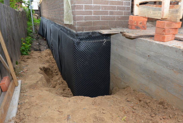 SJ Waterproofing Pros technician performing targeted Foundation Crack Repair assessment in Highland Park, PA